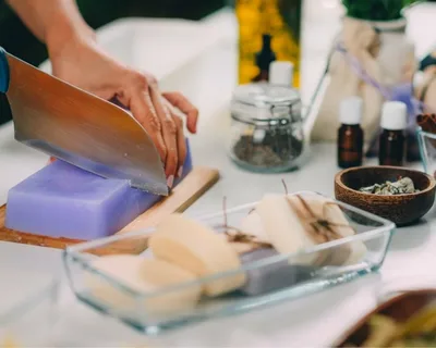 essential tools for soaper including molds, stick blender, scale, and gloves