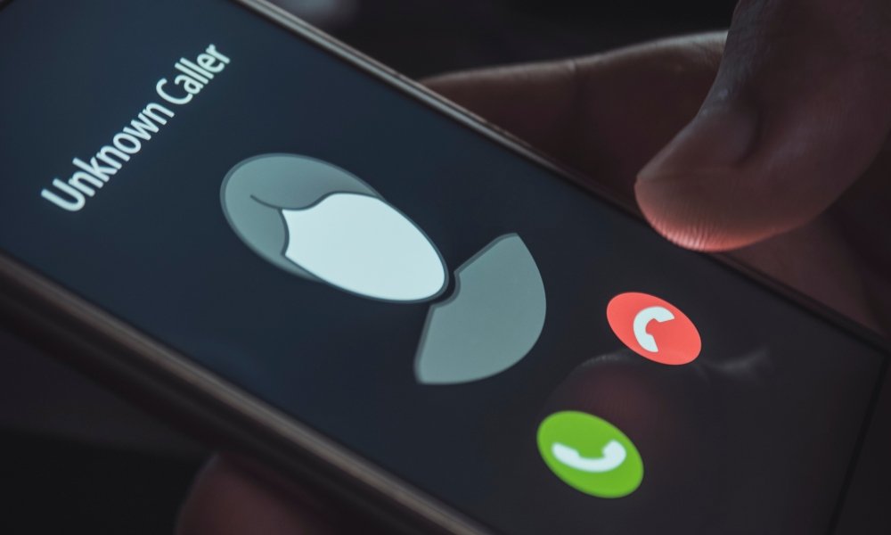Incoming call alert from 2045876705 on smartphone screen