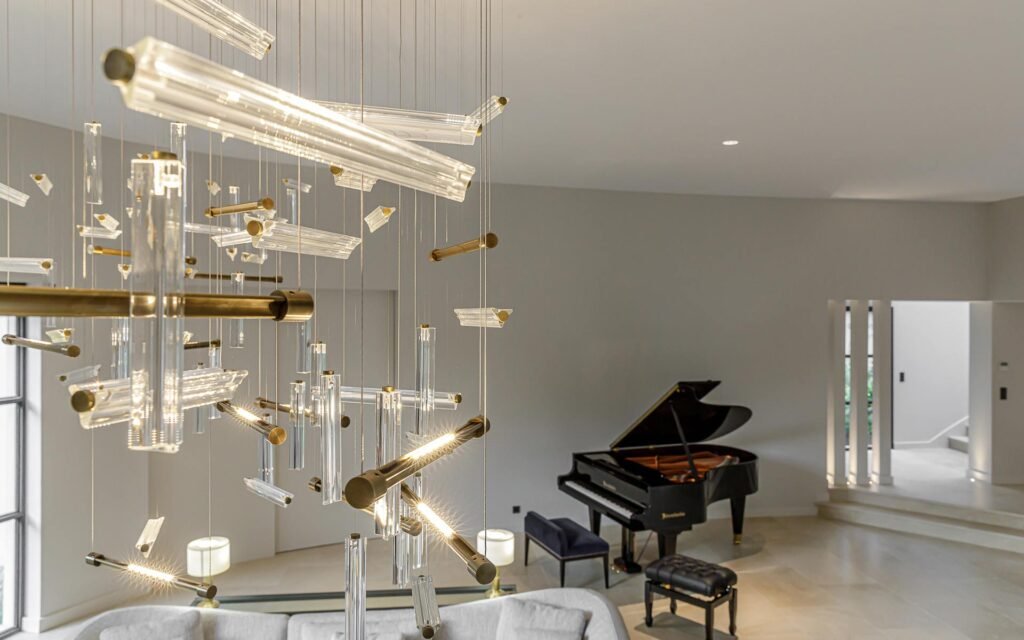 Handcrafted bespoke lighting from The Lamp Workshop illuminating a cozy living space
